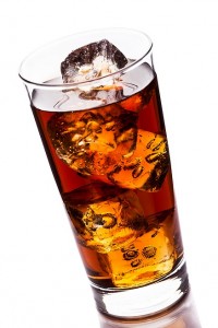 photo of ice tea with ice cubes on white background